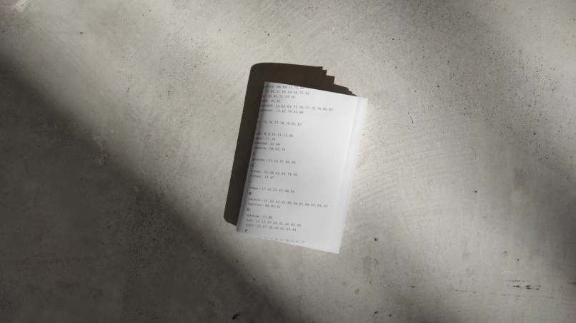 Photo of the first printed prototype. We can see the cover acting as an index but purposedly not entirely readable.